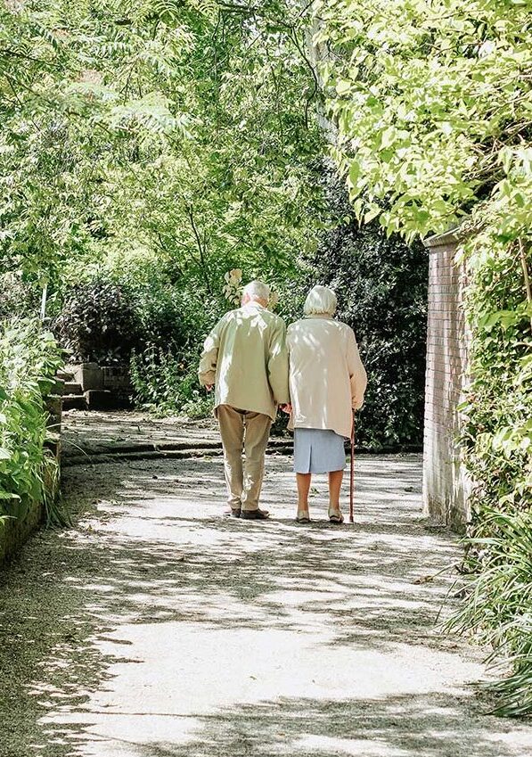 two residents walking together